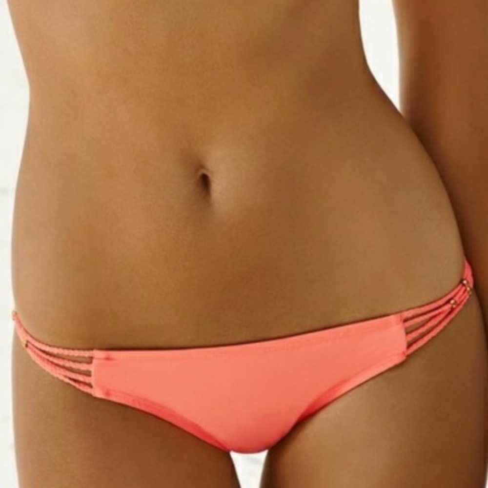 NWOT PILYQ Enjoy Barcelona Braided Bottoms. Orange. Size Small